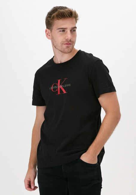 Schwarze CALVIN KLEIN T-shirt ARCHIVAL MONOGRAM FLOCK TEE - large