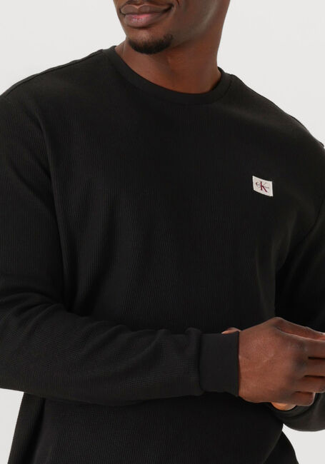 Schwarze CALVIN KLEIN Pullover LS WAFFLE BADGE CREWNK TEE - large