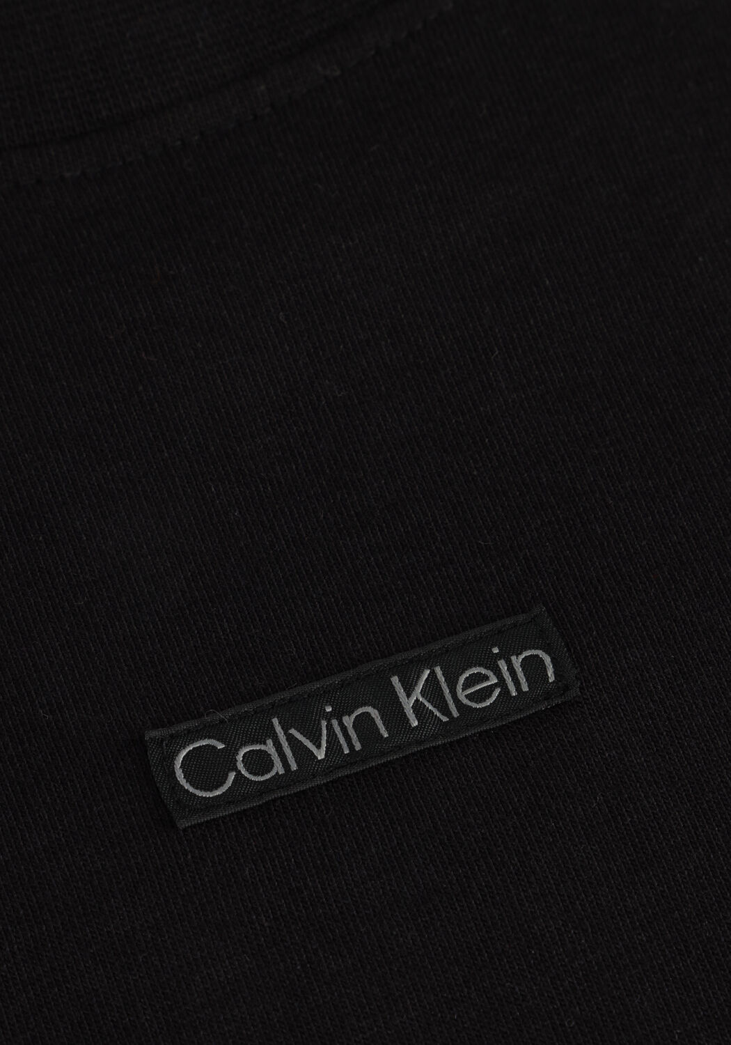 Schwarze CALVIN KLEIN T-shirt PLACED INSTITUTIONAL BABY TEE - large