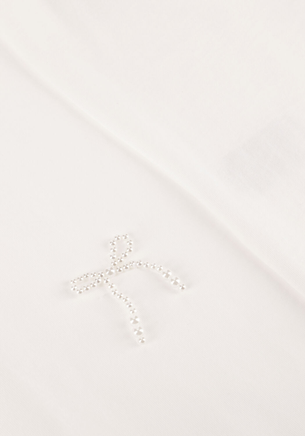 Wei&szlig;e HAUTE L'AMITI&Eacute; T-shirt PEARL BOW TEE - large