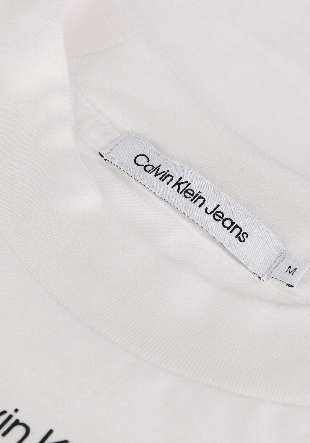 Wei&szlig;e CALVIN KLEIN T-shirt STACKED LOGO LOOSE TEE - large