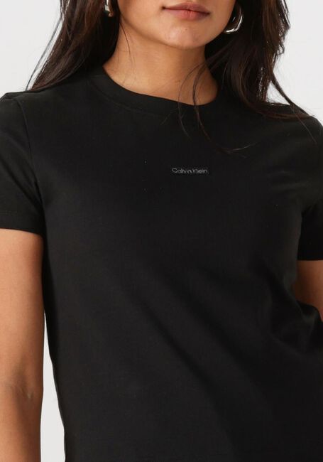 Schwarze CALVIN KLEIN T-shirt PLACED INSTITUTIONAL BABY TEE - large