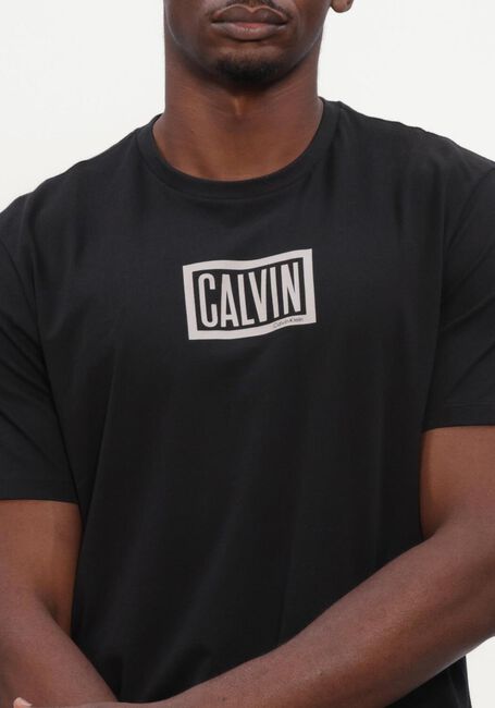 Schwarze CALVIN KLEIN T-shirt SS 30S EU BOXED CALVIN GRAPHIC TEE - large