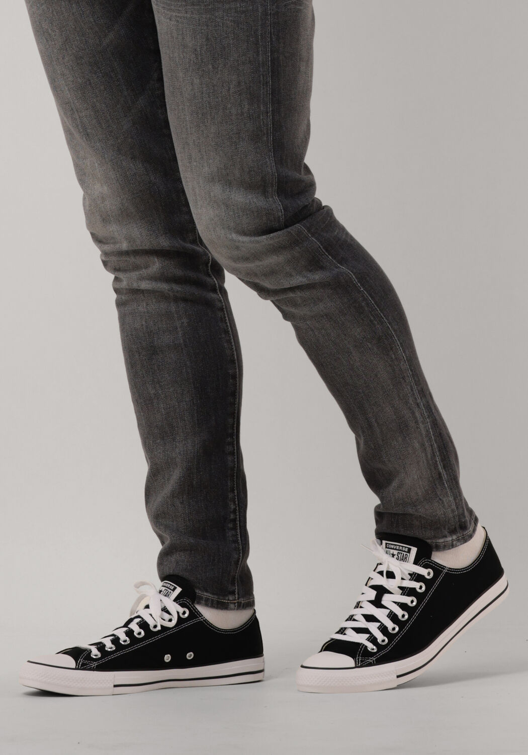 Black low top converse mens store