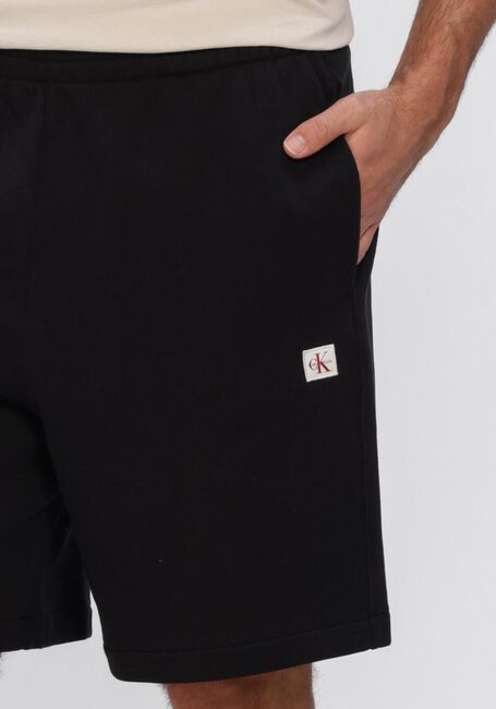 Schwarze CALVIN KLEIN Kurze Hose EU 350TERRY BADGE SHORT - large