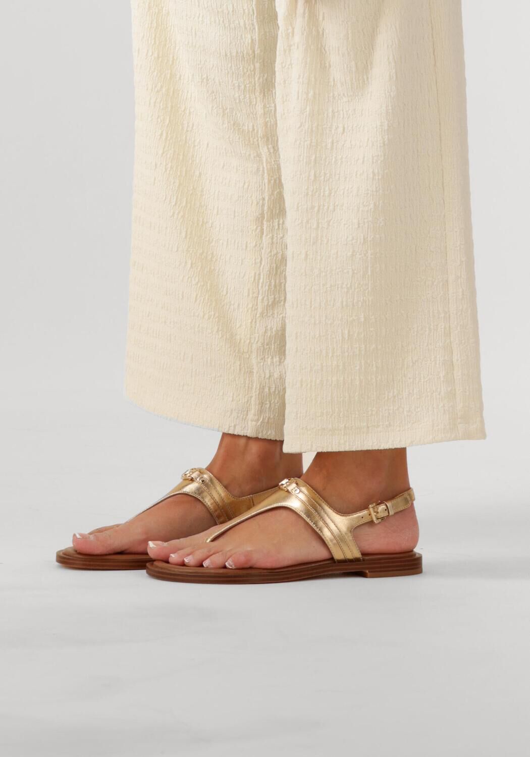 Goldfarbene MICHAEL KORS Flache Sandalen MANDY THONG SANDAL - large