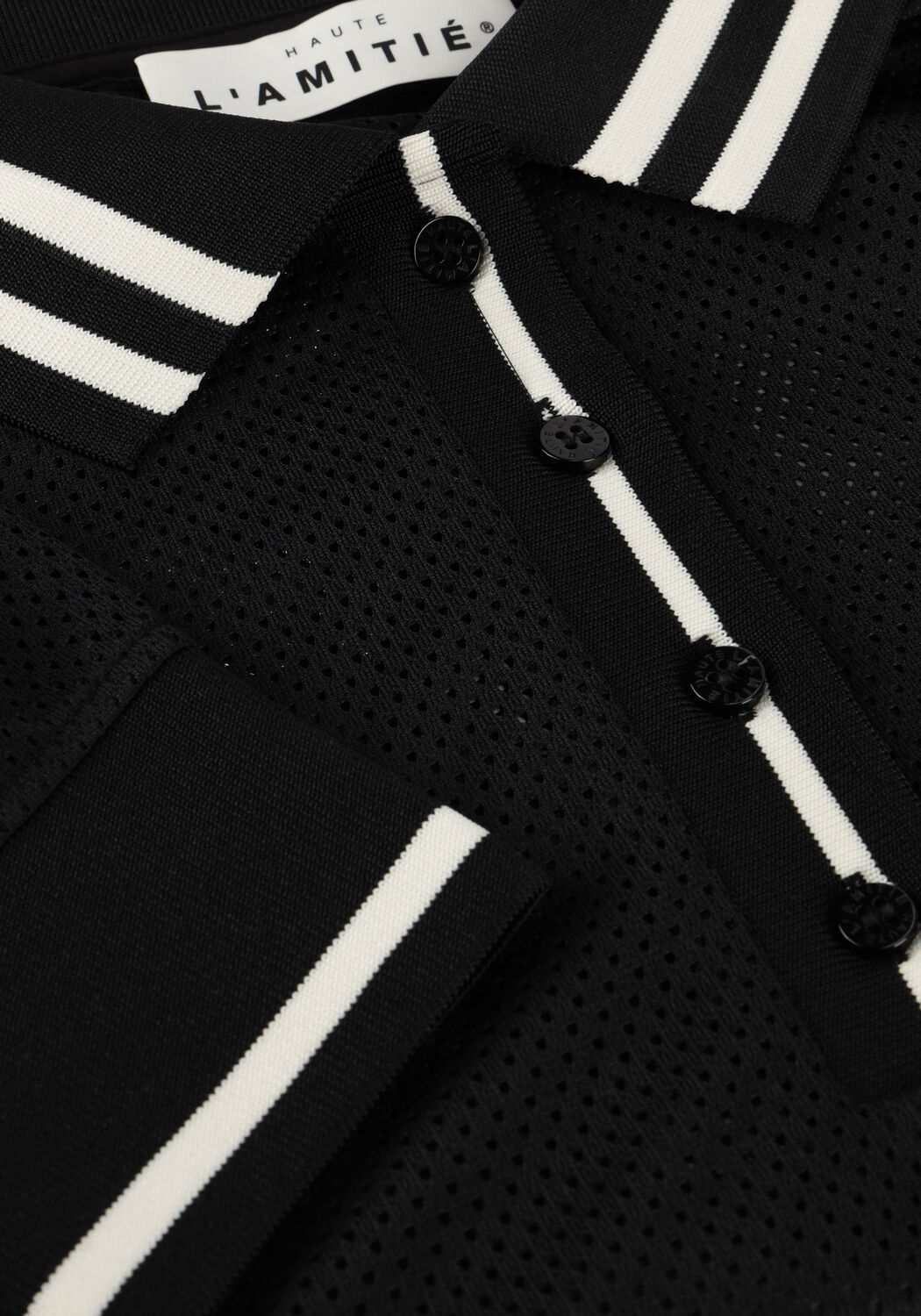 Schwarze HAUTE L'AMITI&Eacute; Polo-Shirt DRIFT POLO BLOUSE - large