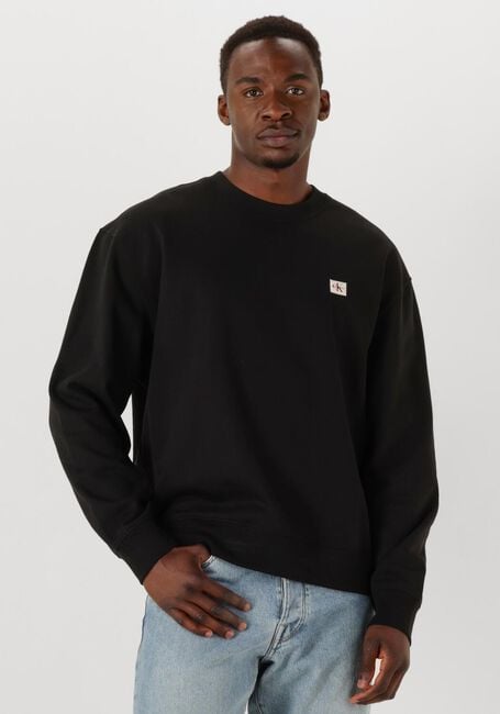 Schwarze CALVIN KLEIN Sweatshirt LS EU BADGE 350TERRY CN SWTSHRT - large