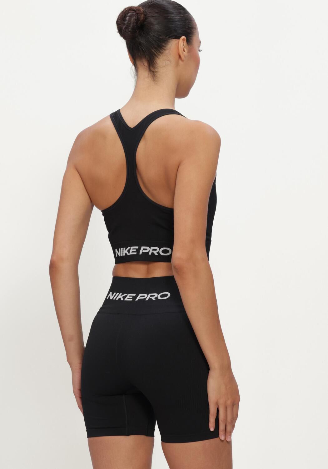 Schwarze NIKE Tops & T-shirts NIKE PRO SEAMLESS - large