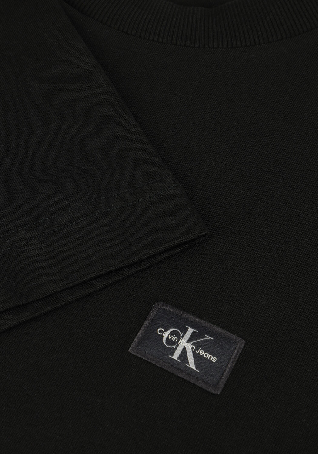 Schwarze CALVIN KLEIN T-shirt WOVEN LABEL REGULAR TEE - large