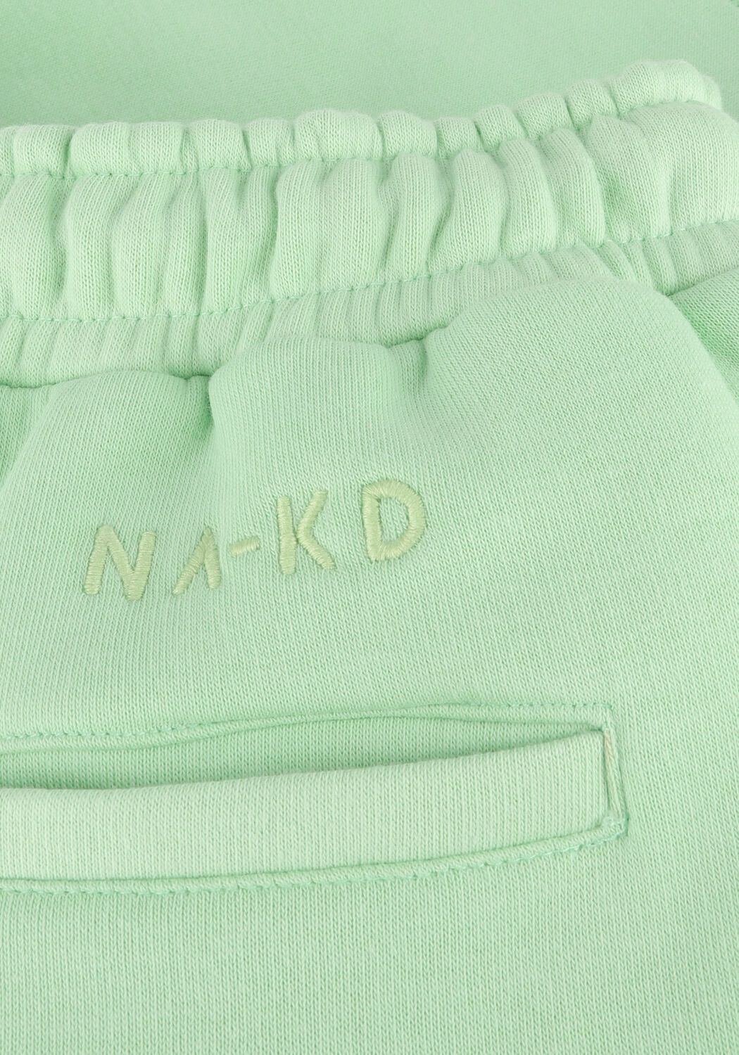 Gr&uuml;ne NA-KD Hosen ORGANIC LOGO SWEATSHORTS - large