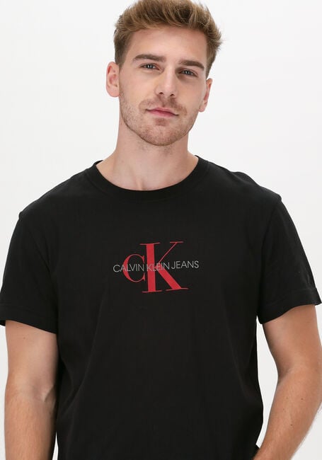 Schwarze CALVIN KLEIN T-shirt ARCHIVAL MONOGRAM FLOCK TEE - large
