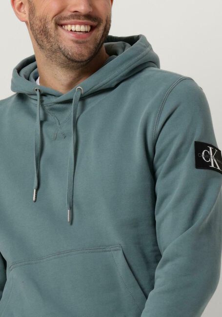 Blaue CALVIN KLEIN Sweatshirt BADGE HOODIE - large