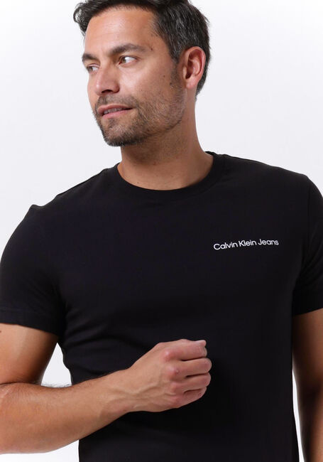 Schwarze CALVIN KLEIN T-shirt CHEST INSTITUTIONAL - large