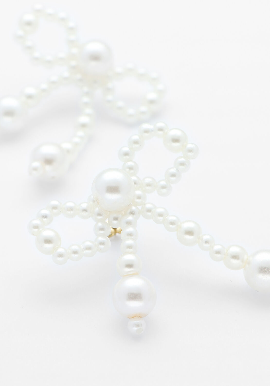 Wei&szlig;e NOTRE-V Ohrringe EARRINGS BOW PEARLS - large