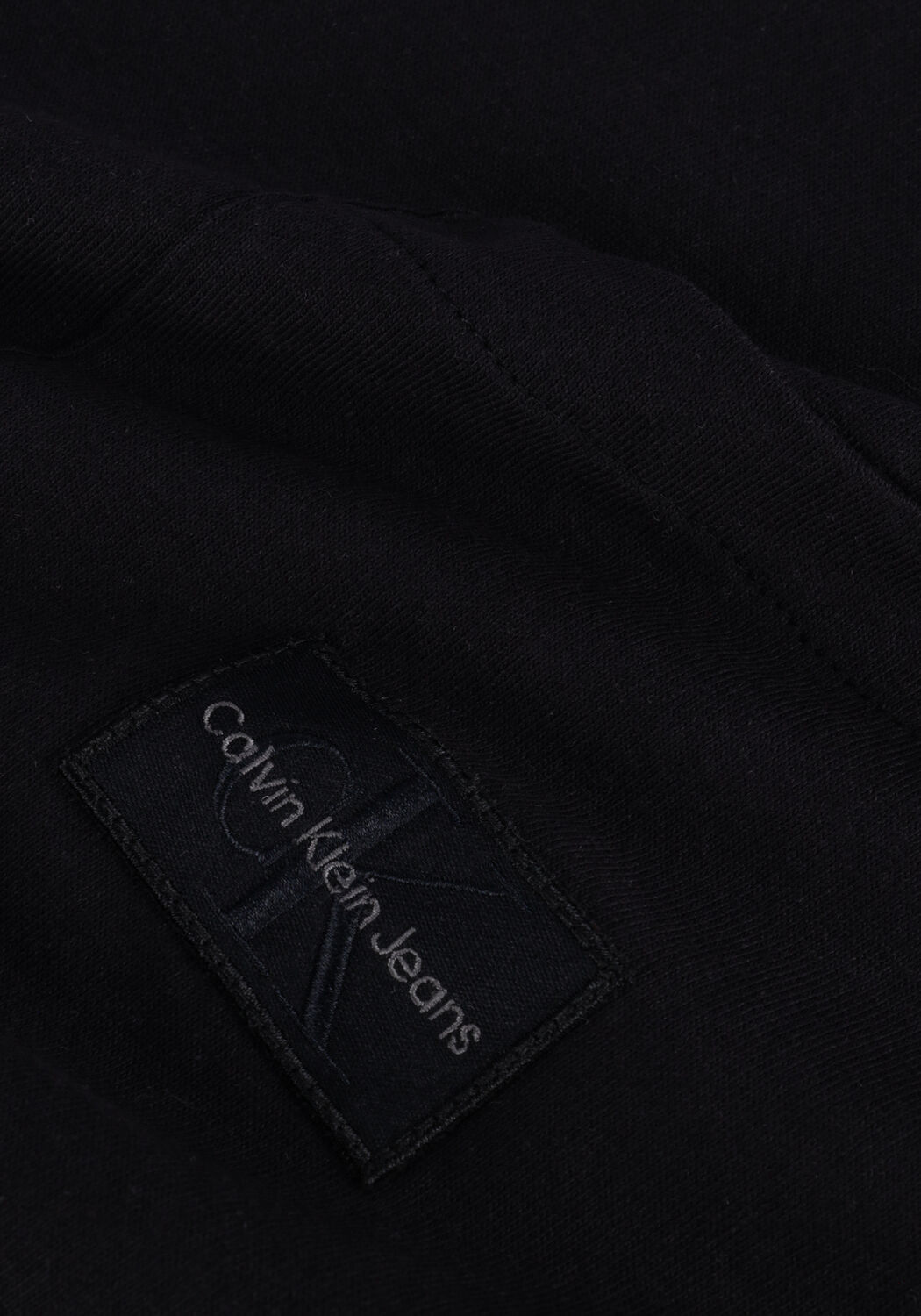 Schwarze CALVIN KLEIN T-shirt SHRUNKEN BADGE POCKET TEE - large