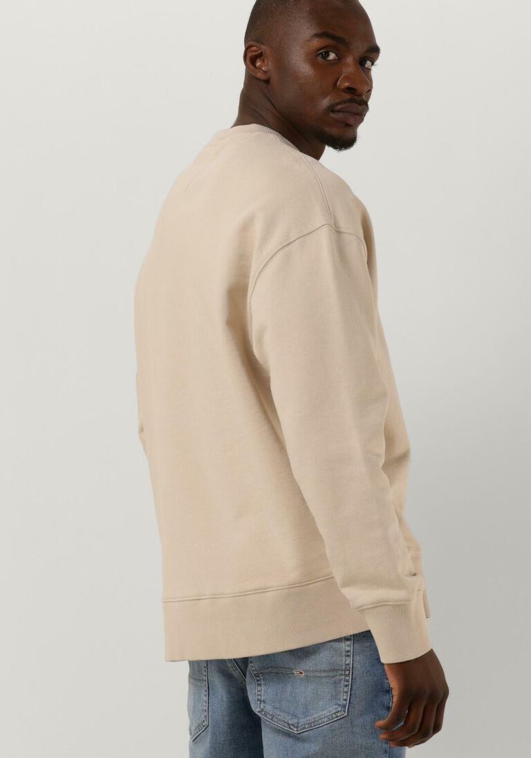 beige tommy jeans sweatshirt tjm rlx xs badge crew IV8135