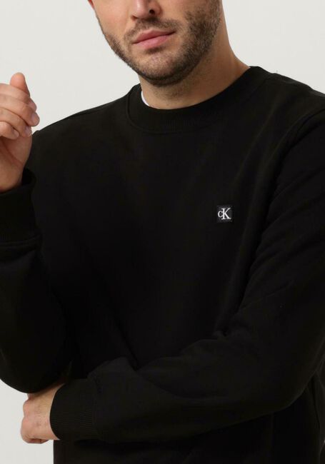 Schwarze CALVIN KLEIN Pullover CK EMBRO BADGE CREW NECK - large