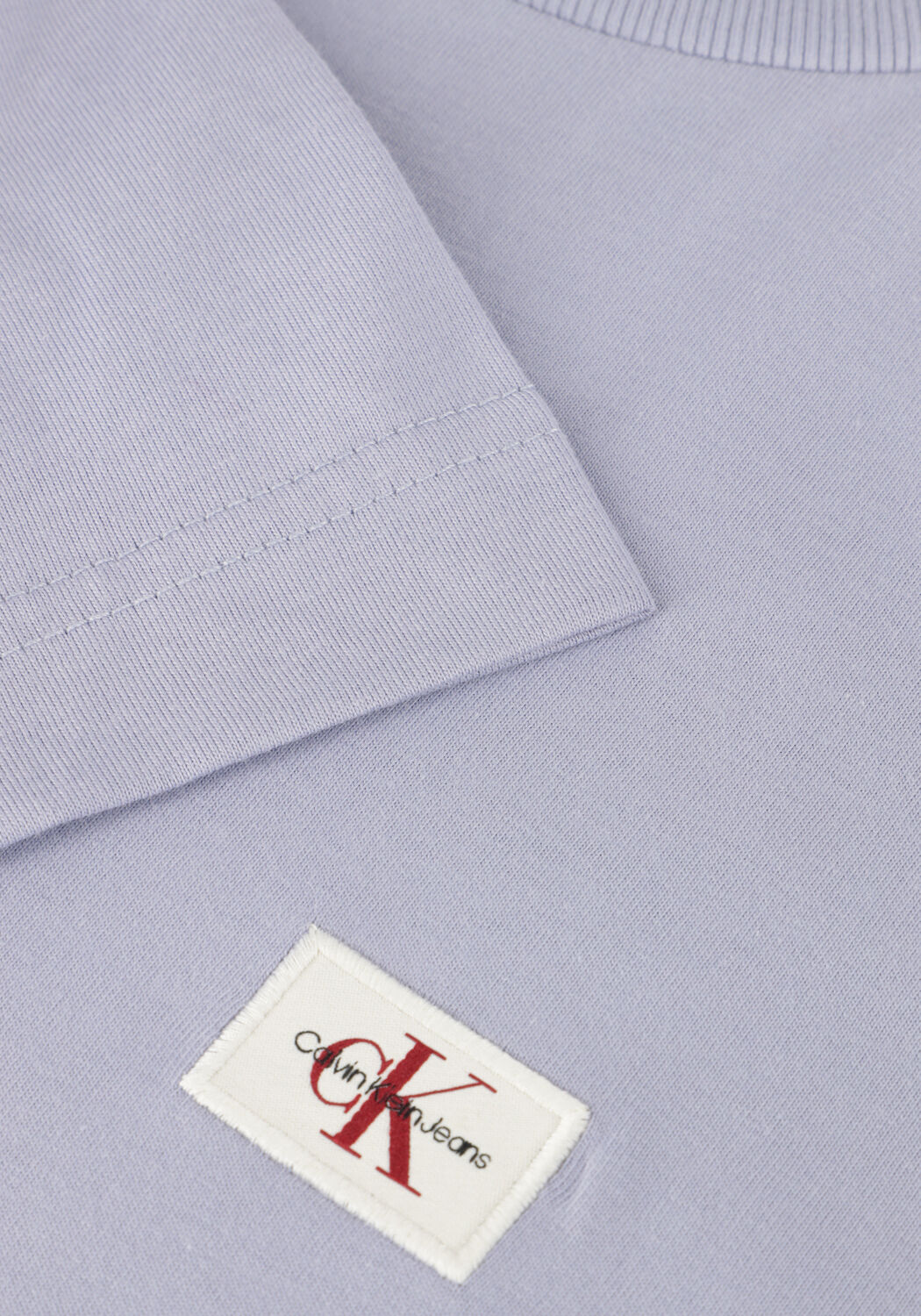 Blaue CALVIN KLEIN T-shirt WOVEN LABEL REGULAR TEE - large