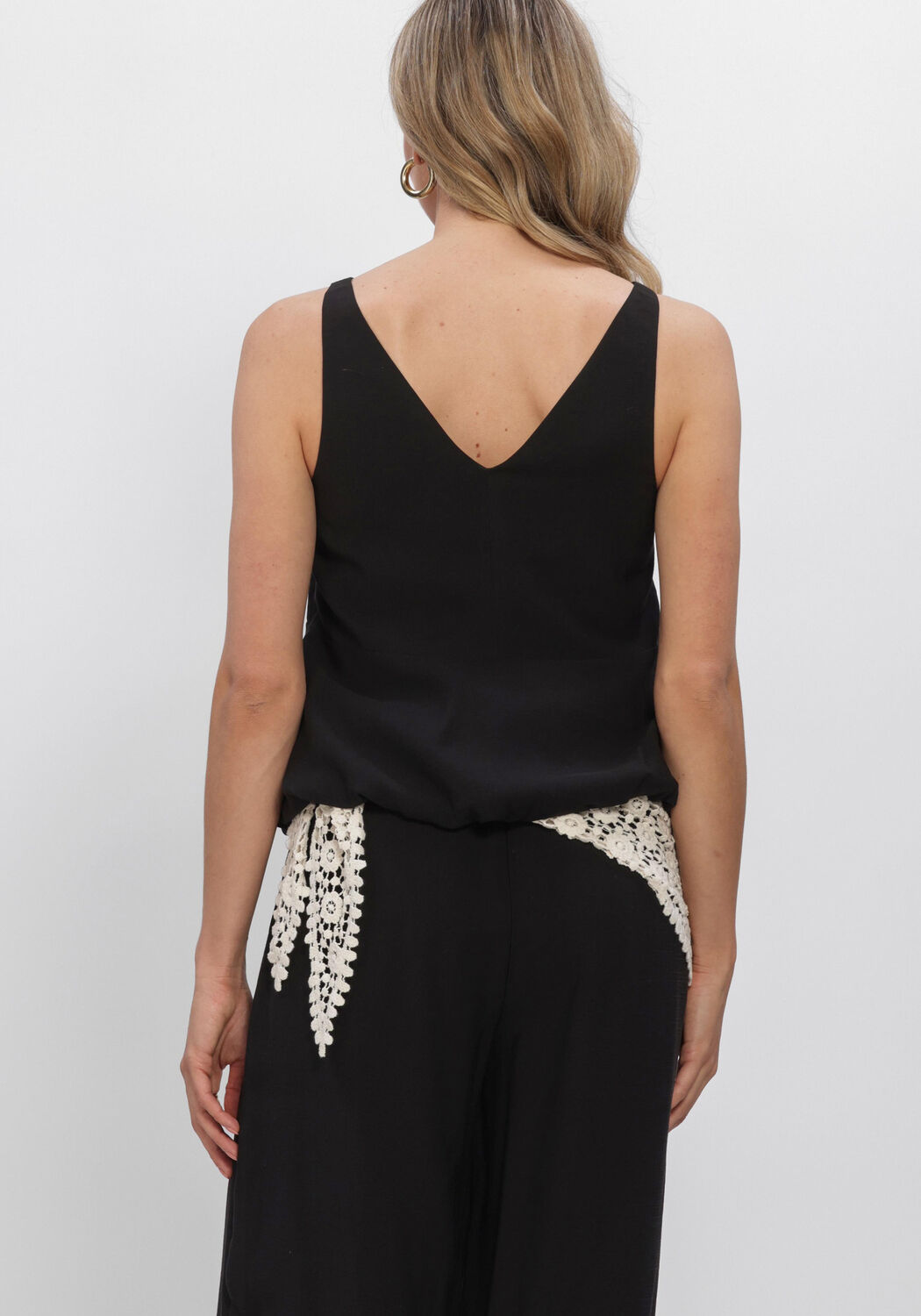 Schwarze EDITED Tops & T-shirts ZOJA PEPLUM TOP - large